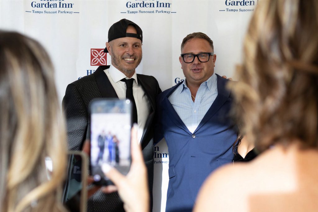 Guests posing for photos at the gala