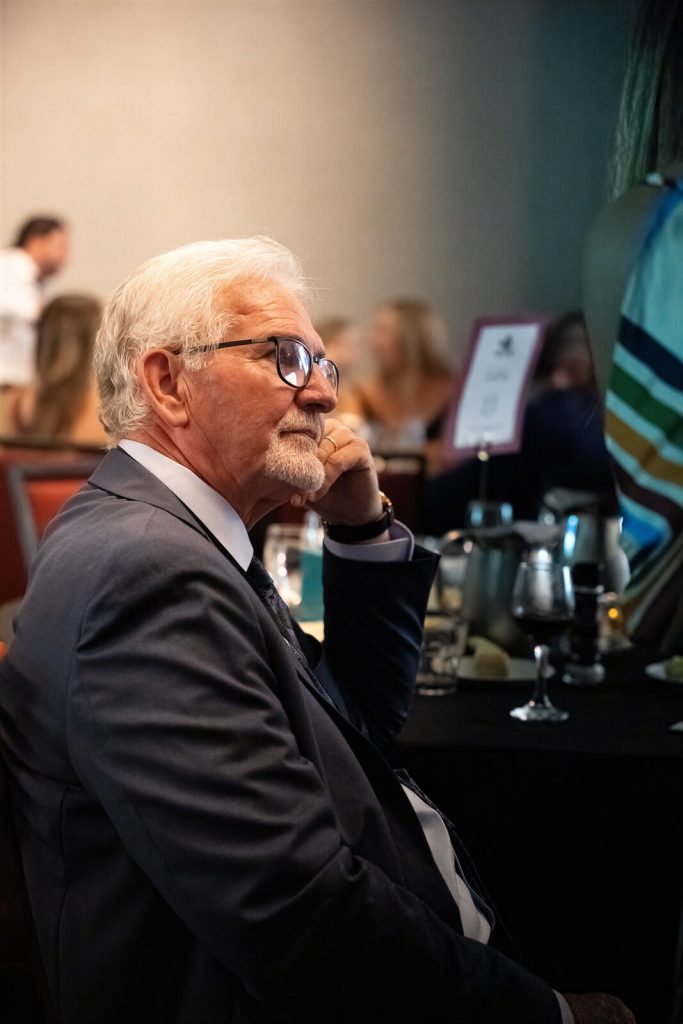 A guest listens during the gala program